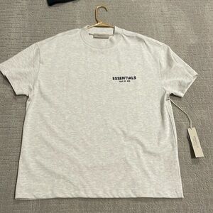 brand new essentials shirt with tag